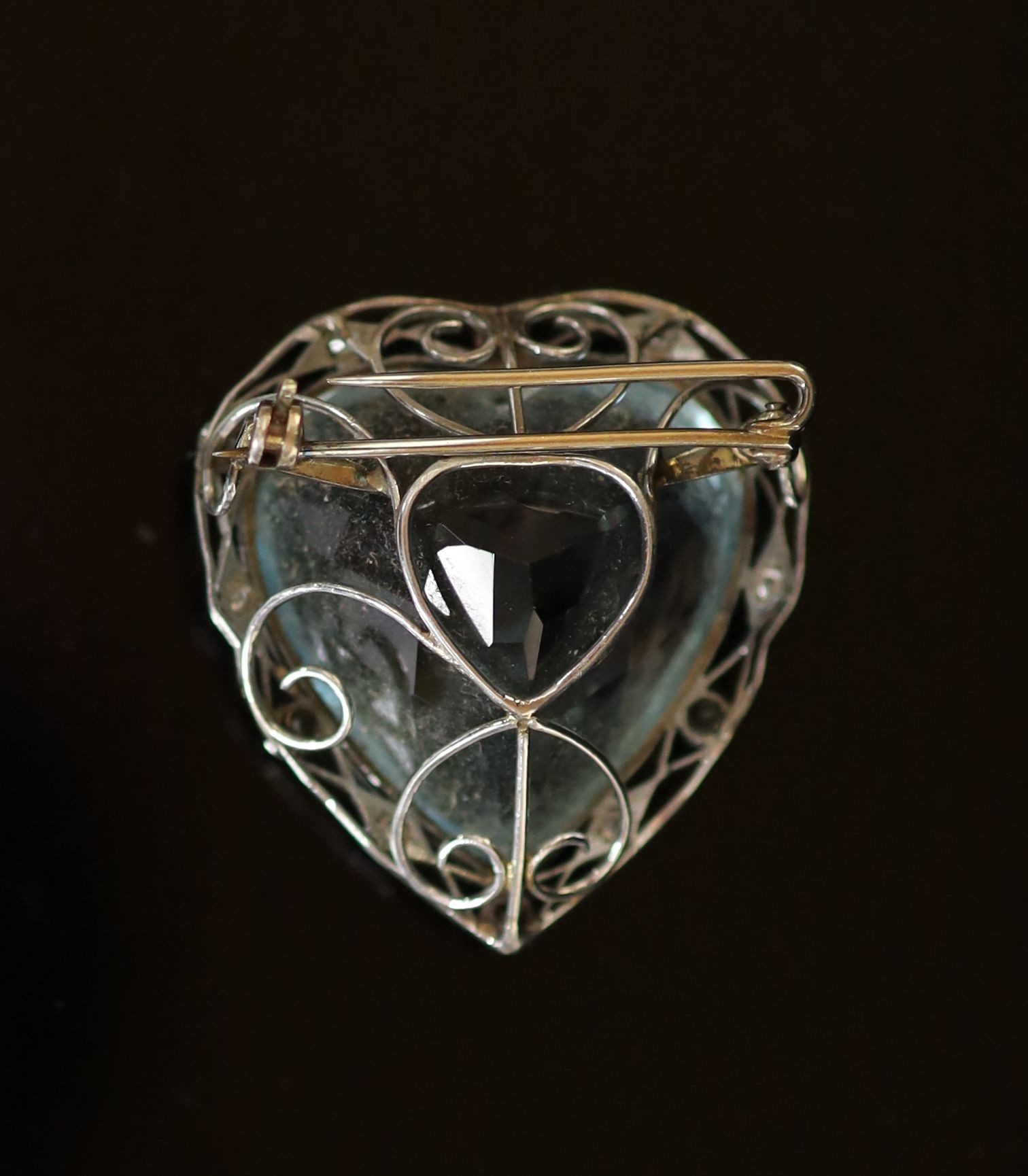 A white gold mounted heart shaped aquamarine and diamond set clip brooch